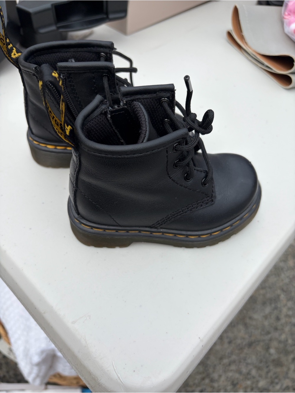 Dr. Martens Kids Black Lace-Up Ankle Boots with Yellow Stitching